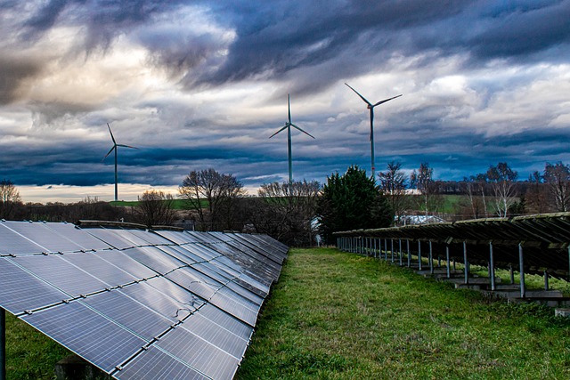 Solar panels and wind turbines generating renewable energy